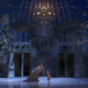 Belle stands before the Beast as they get ready to dance.